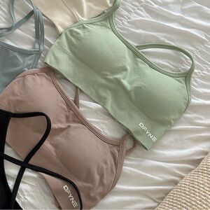 Brown and green DFYNE sports bra